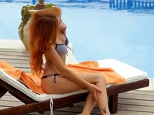 Watch Fiery Michelle Take It Like A Champ By The Pool! The Sultry Redhead Is Guaranteed To Make You Sweat With Her Steamy Moves. Porn