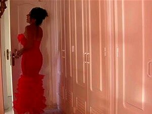 Older Lady Laying On The Couch,