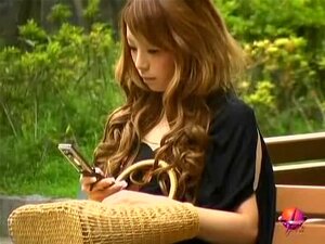 Enchanting Japanese Brunette Getting Uncovered By Some Lad In The Park, Fantastic Brown-haired Pretty Vixen Is Texting Her Boyfriend While Chilling In The Public Park, And Then Some Fellow Comes Over, Grabs Her Top And Pulls It Down While Totally Uncoverin