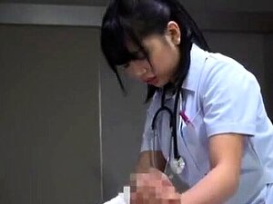 Japanese Medical Staff Aiding Patient To Recover