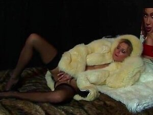 Milf In Fur Jacket With Dildo On Fur Bed